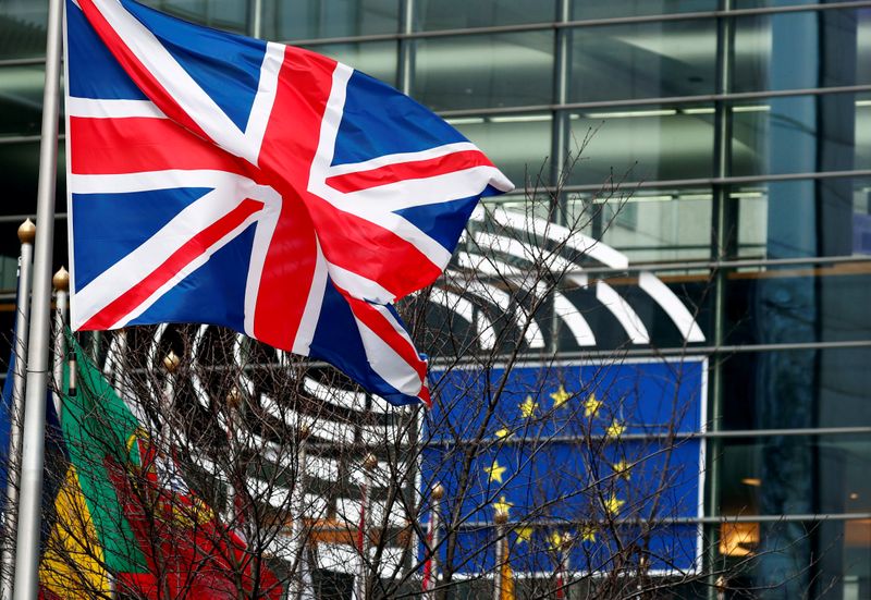 © Reuters. FILE PHOTO: A British Union Jack flag flutters outside the European Parliament in Brussels
