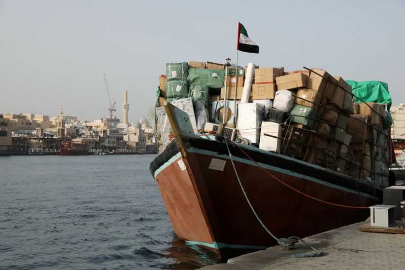 © Reuters. FILE PHOTO: A dhow loaded with goods bound for Iran is seen along the creek in old Dubai