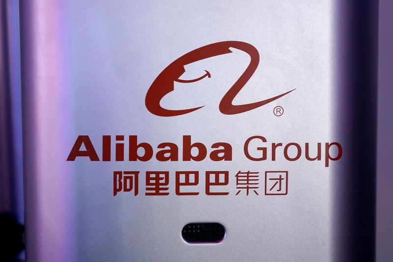 © Reuters. FILE PHOTO: A logo of Alibaba Group is seen during a global shopping festival at a media center in Hangzhou
