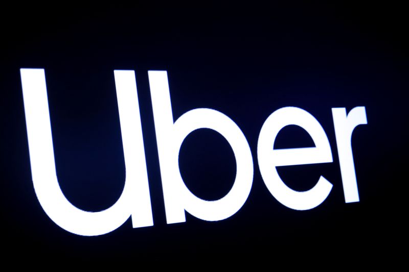 &copy; Reuters. A screen displays the company logo for Uber Technologies Inc. on the day of it&apos;s IPO at the NYSE in New York