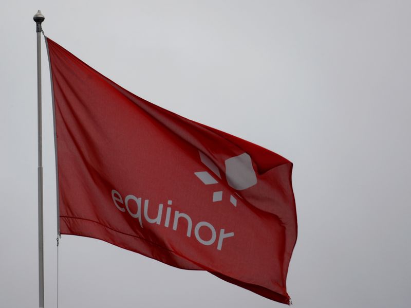 &copy; Reuters. FILE PHOTO: Equinor&apos;s flag flutters next to the company&apos;s headquarters in Stavanger, Norway