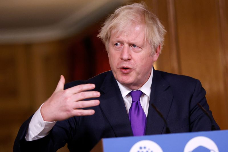 &copy; Reuters. Britain&apos;s PM Johnson attends a news conference in London
