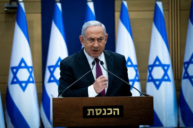 © Reuters. Israeli PM Netanyahu delivers a statement at the Knesset