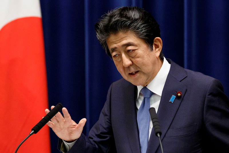 &copy; Reuters. FILE PHOTO: Japanese PM Abe gives news conference in Tokyo