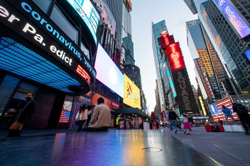 &copy; Reuters. News related to coronavirus disease (COVID-19) are seen on a display at Times Square in New York City, New York