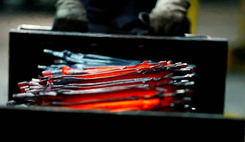 © Reuters. Unfinished pliers still glow after being hot-formed by a hammer at the factory of Knipex in Wuppertal