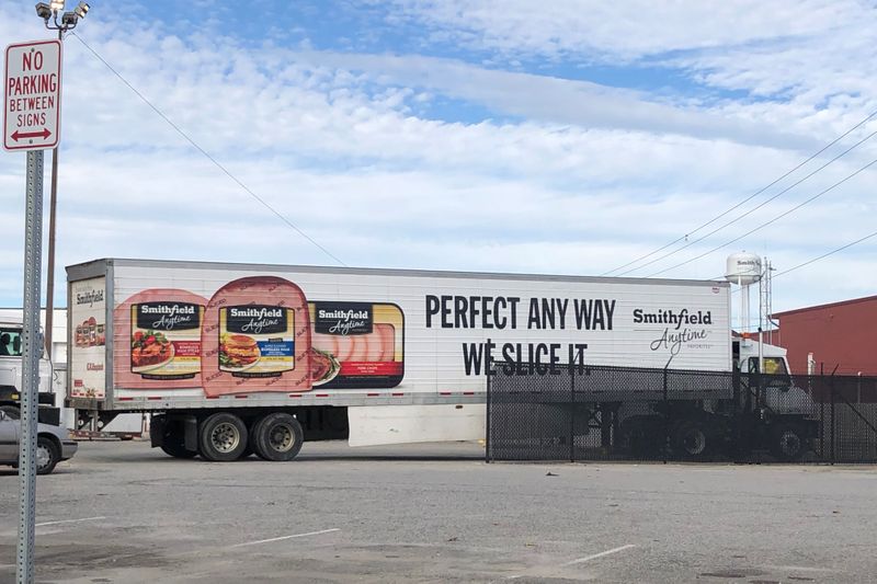 © Reuters. FILE PHOTO:  A truck arrives at Smithfield Foods' pork plant in Smithfield