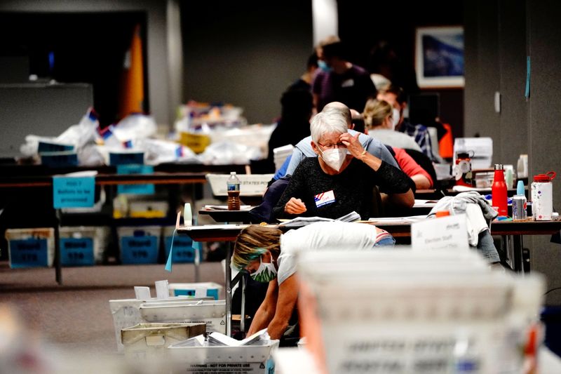 &copy; Reuters. Counting absentee ballots at Milwaukee Central Count