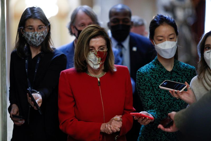 © Reuters. FILE PHOTO: Speaker of the House Pelosi speaks to reporters on Capitol Hill in Washington