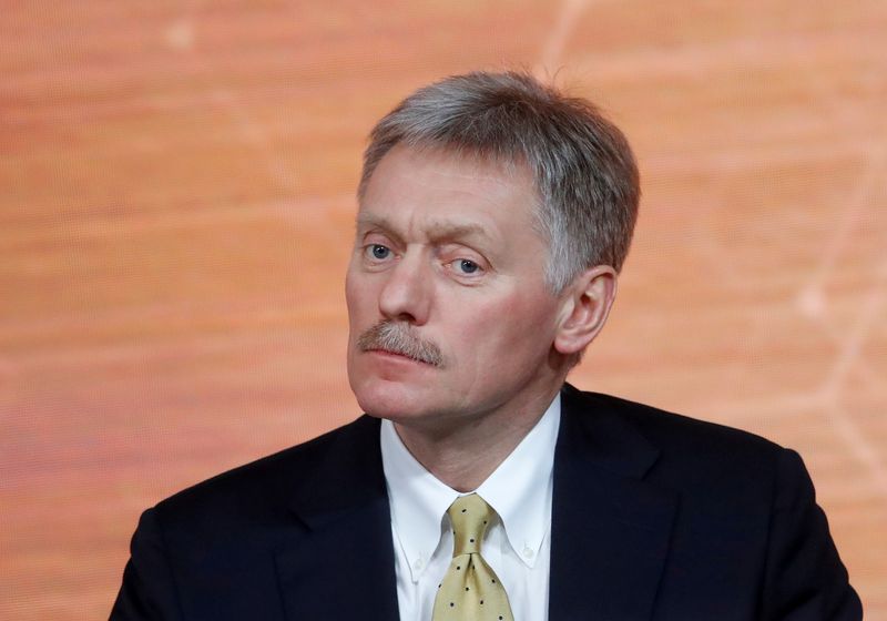 &copy; Reuters. FILE PHOTO: Kremlin spokesman Dmitry Peskov listens during Russian President Vladimir Putin&apos;s annual end-of-year news conference in Moscow