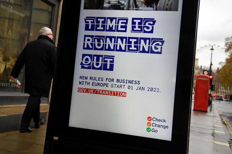 &copy; Reuters. Electronic billboard displays a British government information message, in London