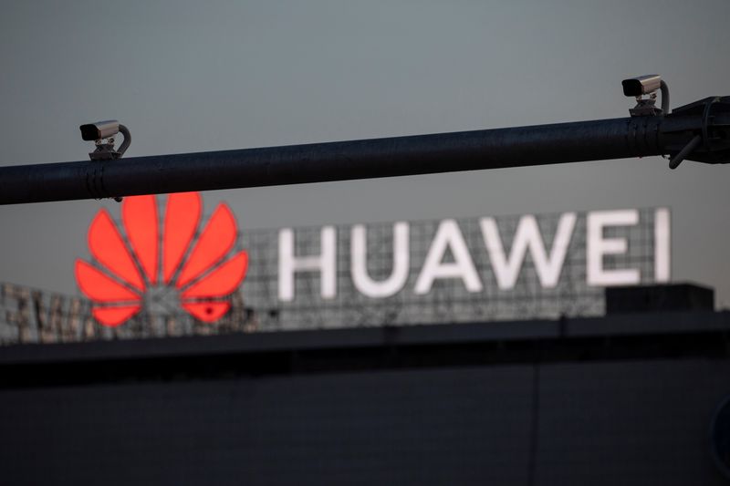 &copy; Reuters. Surveillance cameras are seen in front of a Huawei logo in Belgrade