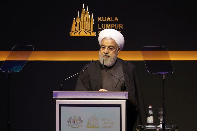 © Reuters. FILE PHOTO: Iranian President Hassan Rouhani speaks during Kuala Lumpur Summit in Kuala Lumpur