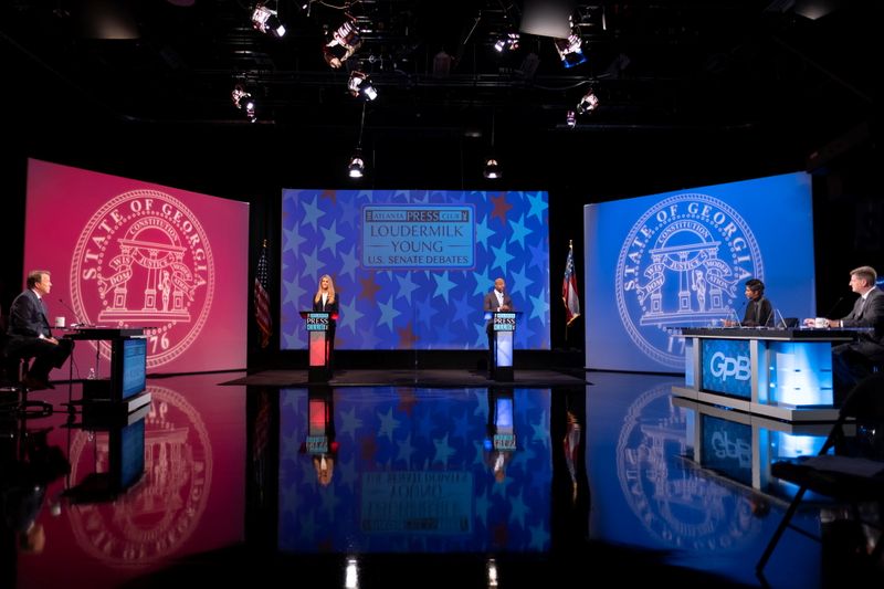 © Reuters. Debate between Democratic challenger Raphael Warnock and Republican incumbent, Senator Kelly Loeffler for U.S. Senate seat representing Georgia