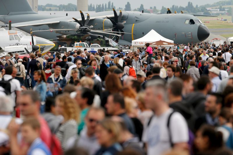 &copy; Reuters. FILE PHOTO: Visitors walk at the static display area during the last day of the 51st Paris Air Show at Le Bourget airport near Paris