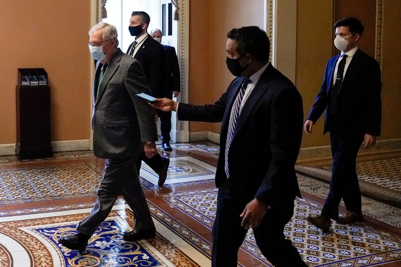 © Reuters. FILE PHOTO: U.S. Sen. Majority Leader Mitch McConnell walks from the Senate floor to his office on Capitol Hill in Washington