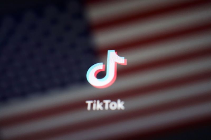 © Reuters. Illustration picture of U.S. flag with TikTok