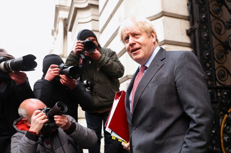 © Reuters. Britain's Prime Minister Boris Johnson walks near Downing Street, in London
