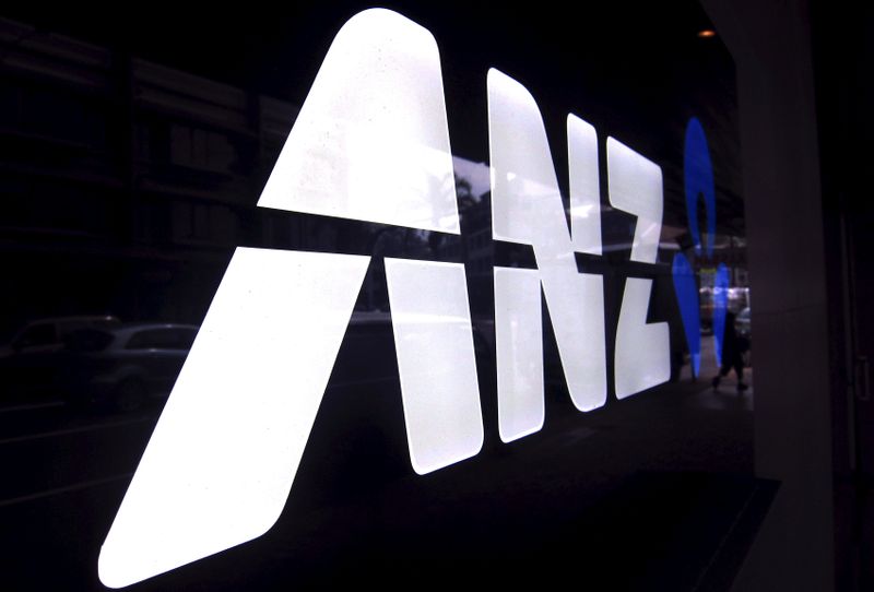 &copy; Reuters. A man walks past a branch of the Australia and New Zealand Banking Group Ltd (ANZ) in Sydney