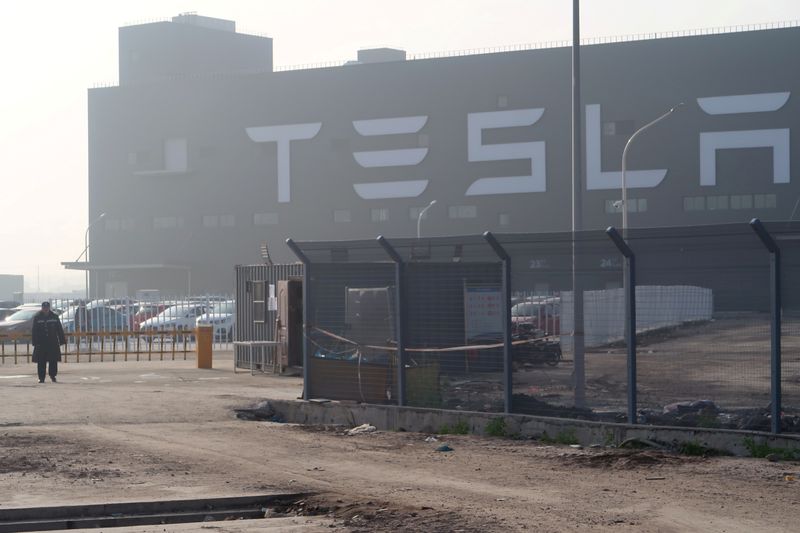 &copy; Reuters. FILE PHOTO: A Tesla sign is seen on the Shanghai Gigafactory of the U.S. electric car maker