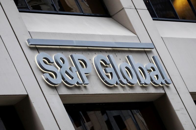 © Reuters. FILE PHOTO: The S&P Global logo is displayed on its offices in the financial district in New York