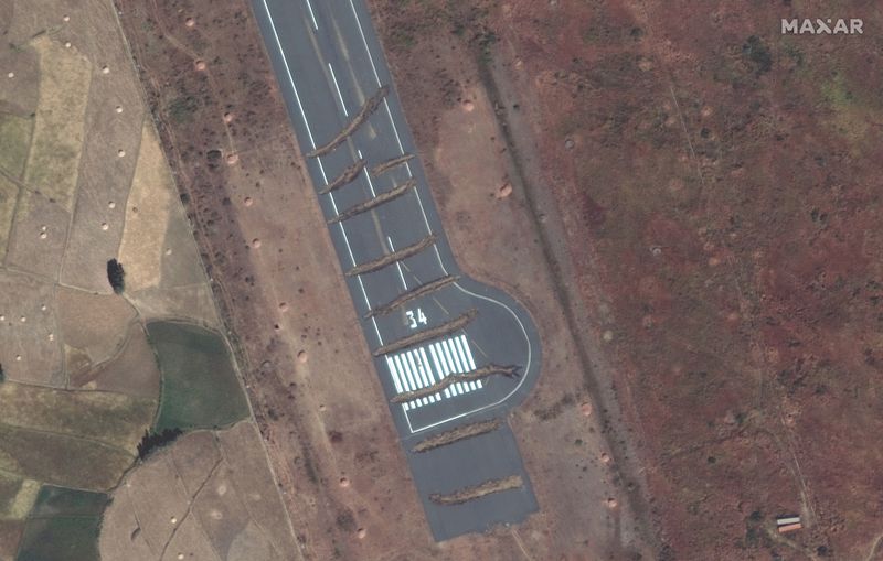 © Reuters. Trenches can be seen across the runway of Aksum Airport