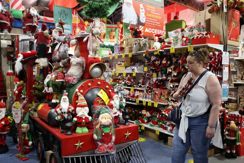 &copy; Reuters. A customer shops inside a Christmas store in Sydney