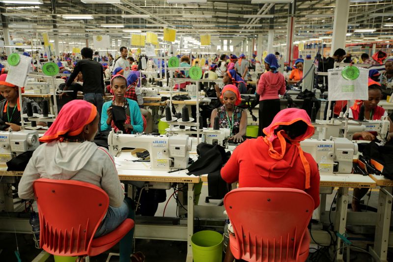 &copy; Reuters. FILE PHOTO: Workers sew clothes inside the Indochine Apparel textile factory in Hawassa Industrial Park in Southern Nations, Nationalities and Peoples region