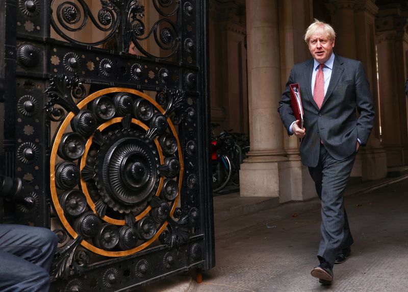 &copy; Reuters. Britain&apos;s Prime Minister Boris Johnson walks near Downing Street, in London