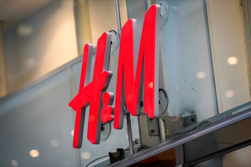 © Reuters. FILE PHOTO: An H&M logotype is seen at a shop in Stockholm