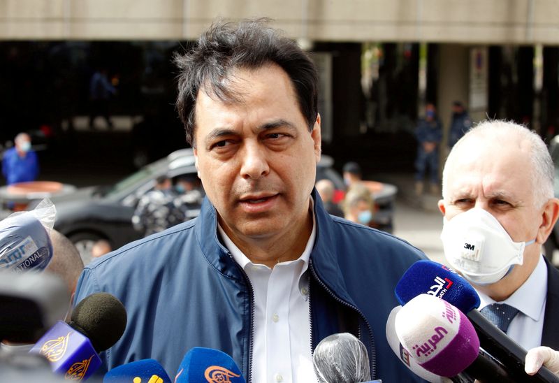 &copy; Reuters. FILE PHOTO: Lebanese Prime Minister Hassan Diab speaks to the media outside Beirut&apos;s international airport