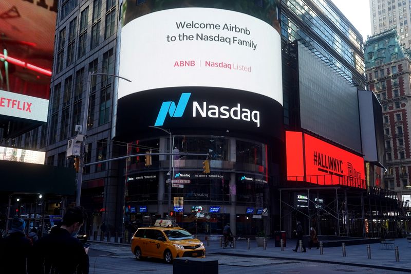 &copy; Reuters. The NASDAQ market site displays an AirBnb sign on their billboard on the day of their IPO in Times Square