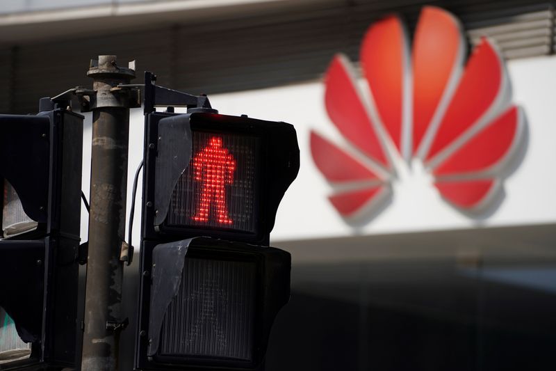 &copy; Reuters. FILE PHOTO: A Huawei company logo is seen outside a shopping mall in Shanghai