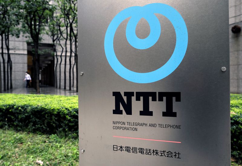 &copy; Reuters. The logo of NTT (Nippon Telegraph and Telephone Corporation) is displayed at the company office in Tokyo