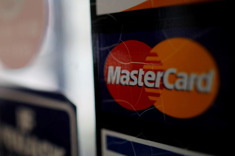 &copy; Reuters. FILE PHOTO: A sticker shows that a store accepts MasterCard in Harvard Square in Cambridge