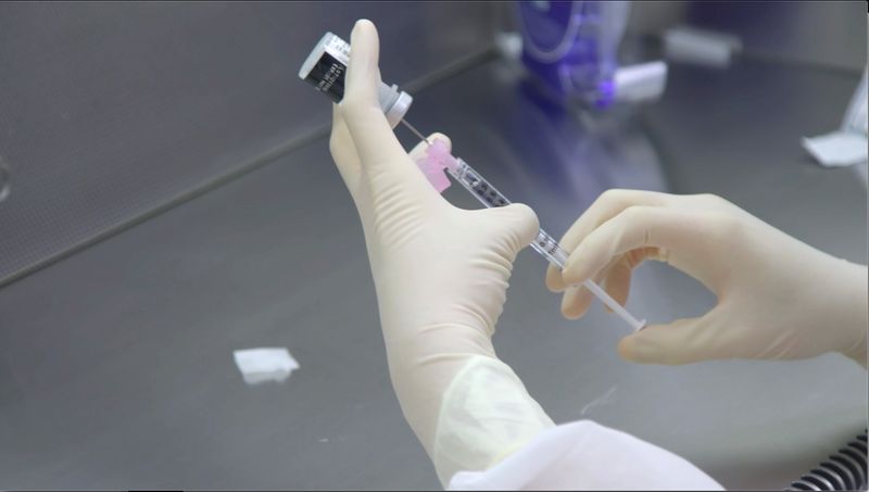 © Reuters. Handout photos of preparation for COVID-19 vaccine