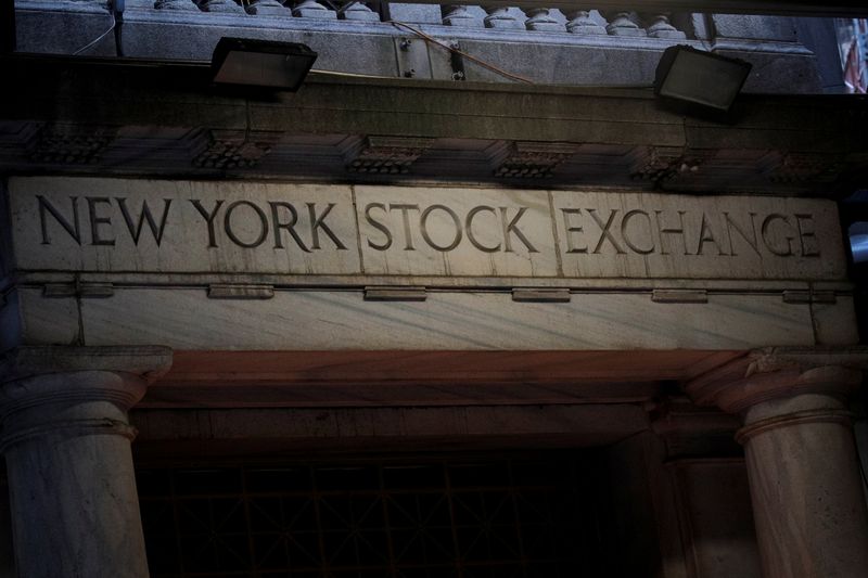 © Reuters. FILE PHOTO: The Wall St. entrance to the NYSE is seen in the financial district in New York