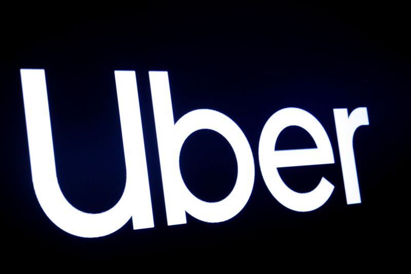 &copy; Reuters. FILE PHOTO: A screen displays the company logo for Uber Technologies Inc in 2019