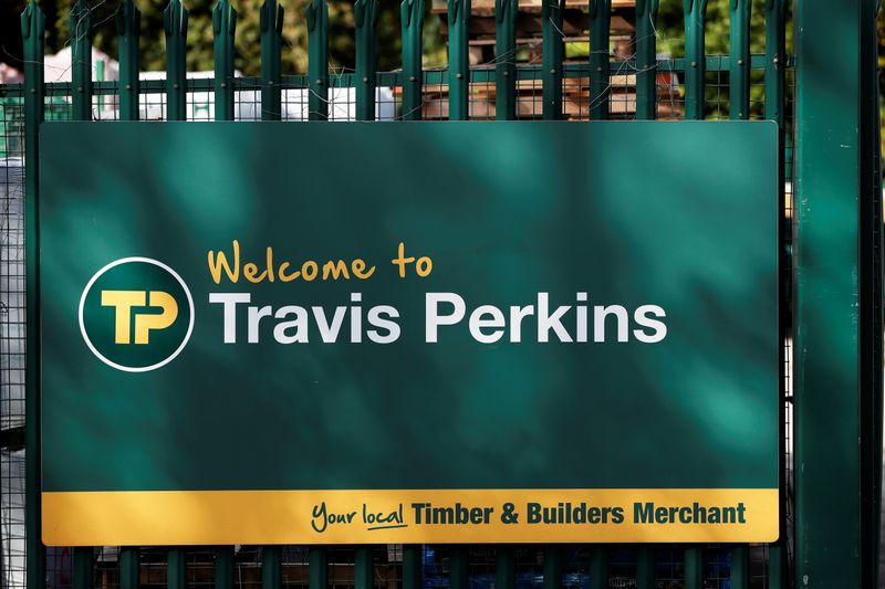 &copy; Reuters. Signage is pictured at Travis Perkins, a timber and building merchants yard in St Albans