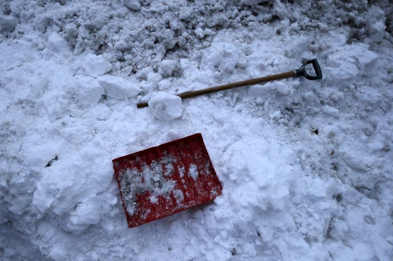 &copy; Reuters. A broken snow shovel is seen in a snow pile in the Brooklyn borough of New York