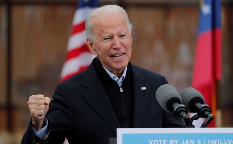 &copy; Reuters. U.S. President-elect Joe Biden campaigns on behalf of Democratic U.S. senate candidates Ossoff and Warnock in Atlanta, Georgia