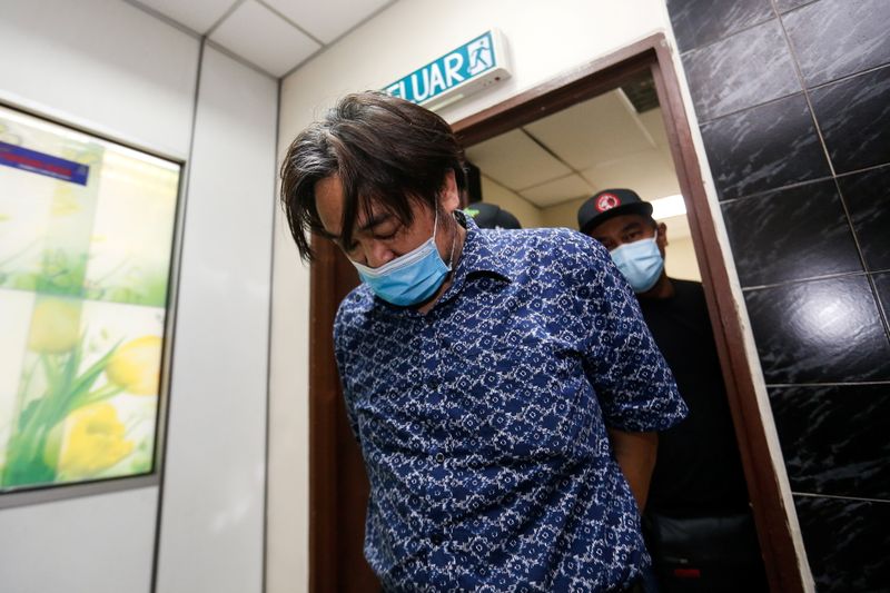 &copy; Reuters. South Korean pastor Jee Jong Hoon arrives at Butterworth Court in Penang