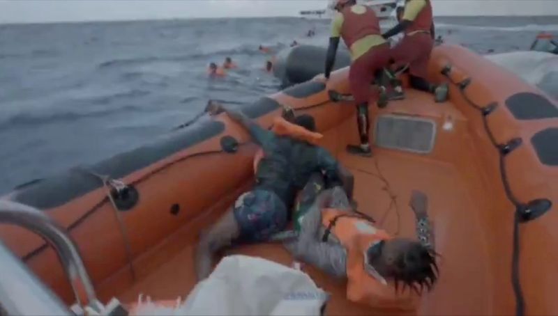 &copy; Reuters. FILE PHOTO: Migrants are rescued by Spanish search and rescue ship Open Arms in the Mediterranean Sea