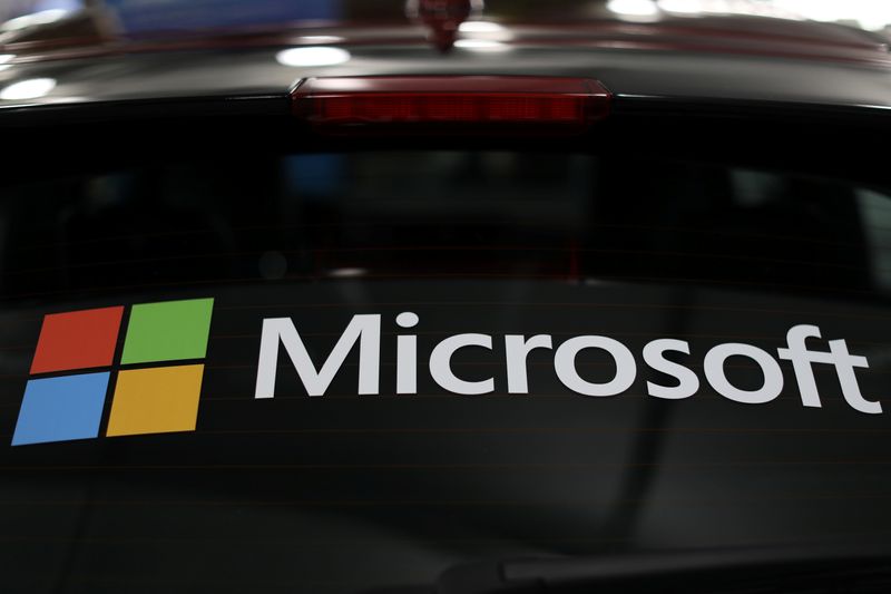 &copy; Reuters. The Microsoft logo is shown on an electric car at the Auto Show in Los Angeles