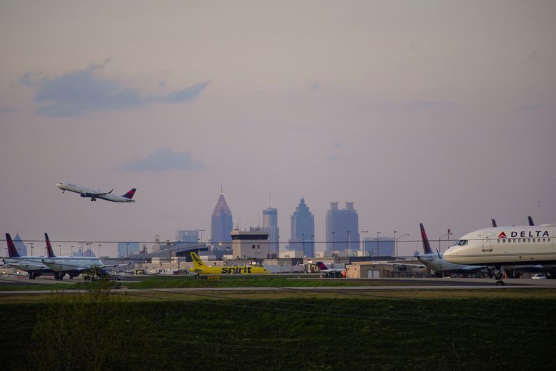 &copy; Reuters. Delta Air Lines passenger planes crowd a runway in Atlanta