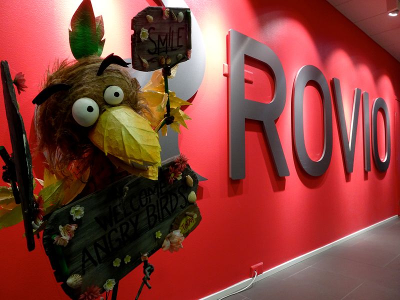 &copy; Reuters. A company sign and an Angry Birds game character are seen at the Rovio headquarters in Espoo