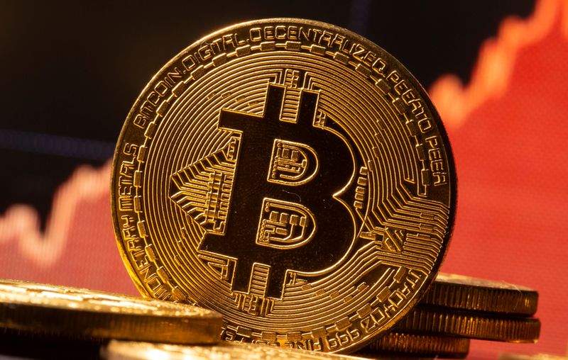 &copy; Reuters. FILE PHOTO: A representation of virtual currency Bitcoin is seen in front of a stock graph