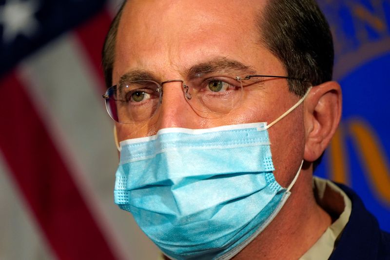 &copy; Reuters. Health and Human Services Secretary Alex Azar speaks before watching COVID-19 vaccines being administered to hospital workers at George Washington University Hospital in Washington