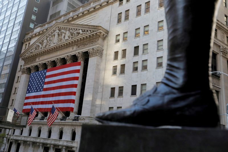 &copy; Reuters. FILE PHOTO: The boot on the statue of former U.S. President George Washington is seen across the New York Stock Exchange (NYSE) following Election Day in Manhattan, New York City