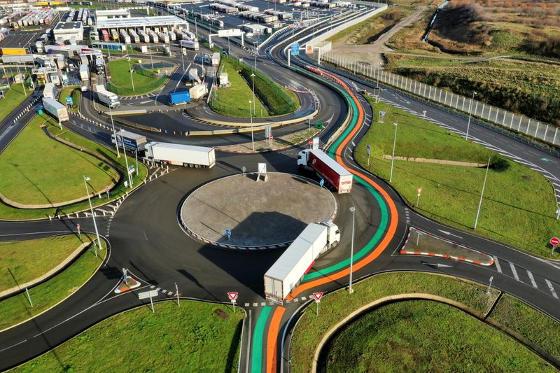 &copy; Reuters. Orange and green lanes for entry into France and the EU are seen on the road as new customs infrastructure in case of &quot;no deal&quot; Brexit at Eurotunnel terminal in Coquelles